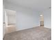 Bedroom featuring neutral carpet and ensuite bathroom at 5213 Patano Loop, Palmetto, FL 34221