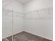 Walk-in closet features wire shelving and neutral carpeting at 5213 Patano Loop, Palmetto, FL 34221