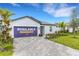 Charming move-in ready home with landscaped yard and paved driveway in a desirable neighborhood at 5213 Patano Loop, Palmetto, FL 34221