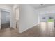 Hallway leading to the laundry room and the living room at 5213 Patano Loop, Palmetto, FL 34221