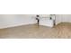Spacious open-concept living area with kitchen featuring stainless appliances and lots of natural light at 5213 Patano Loop, Palmetto, FL 34221