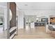 Open-concept kitchen featuring modern appliances, a large island, and sleek cabinetry at 5285 Far Oak Cir, Sarasota, FL 34238