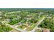 Beautiful aerial view of property nestled among trees and lush landscaping in quiet community at 5307 Kenvil Dr, North Port, FL 34288