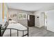 Comfortable bedroom offering laminate flooring and natural light, with closet and ample space at 5412 Skyline Pl, Sarasota, FL 34232