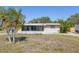 Exterior front view of a single story house with a lawn and showing the covered porch at 5705 23Rd W St, Bradenton, FL 34207