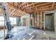 Interior shot reveals exposed wooden beams and studs of a home, offering renovation potential at 5705 23Rd W St, Bradenton, FL 34207