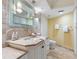 Bathroom featuring a vanity with a stone countertop, and modern fixtures at 5880 Midnight Pass Rd # 207, Sarasota, FL 34242