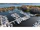 Aerial shot of a marina showcasing a large number of boats docked in a scenic waterfront setting at 610 Riviera Dunes Way # 503, Palmetto, FL 34221