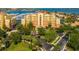 Beautiful waterfront building featuring lush landscaping and convenient parking at 610 Riviera Dunes Way # 503, Palmetto, FL 34221