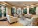 Bright community clubhouse featuring comfortable seating, a coffee table, and plenty of windows at 610 Riviera Dunes Way # 503, Palmetto, FL 34221