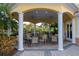 Community gazebo with seating areas and a grilling station, perfect for outdoor entertaining at 610 Riviera Dunes Way # 503, Palmetto, FL 34221