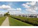 Picturesque marina view with boats docked along the waterway and lush landscaping at 610 Riviera Dunes Way # 503, Palmetto, FL 34221