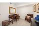 Traditional home office with wooden desk, leather chair, decorative accents and neutral wall tones at 610 Riviera Dunes Way # 503, Palmetto, FL 34221