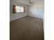 Bedroom featuring carpet flooring, white walls, and a ceiling fan with lighting at 6300 Flotilla Dr # 108, Holmes Beach, FL 34217