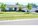 Charming single-story home with a well-manicured lawn and freshly planted landscaping, creating great curb appeal at 6704 Rosemary Dr, Tampa, FL 33625