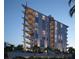 Modern condo building with unique architecture, private balconies and lush tropical landscaping at 688 Golden Gate Point # 201, Sarasota, FL 34236