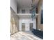 Modern lobby featuring a reception desk, contemporary lighting, and elevator access at 688 Golden Gate Point # 201, Sarasota, FL 34236