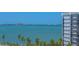 Scenic water view showcasing a tranquil bay and skyline in the distance at 688 Golden Gate Point # 201, Sarasota, FL 34236