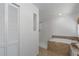 Bright bathroom with a soaking tub, tiled shower, and ample storage space at 7251 Fish Farm Rd, Palmetto, FL 34221