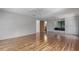 Spacious bonus room with wood floors, large windows and access to bathroom at 7251 Fish Farm Rd, Palmetto, FL 34221