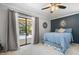 Relaxing bedroom with sliding door to patio, natural light, and soft textures at 7321 Hemlock Ln, Sarasota, FL 34241