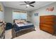 Cozy bedroom with natural light, a ceiling fan, and playful decorations at 7321 Hemlock Ln, Sarasota, FL 34241
