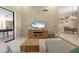 Spacious living area with tile flooring, modern decor, and a view to the dining area at 7321 Hemlock Ln, Sarasota, FL 34241