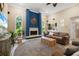 Bright living room with fireplace, wet bar, and neutral tones at 7321 Hemlock Ln, Sarasota, FL 34241