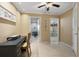 Bright office space with tan walls, tile floor, and two doorways leading to other rooms at 7321 Hemlock Ln, Sarasota, FL 34241