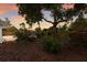 Well-manicured backyard featuring lush landscaping and a wooden fence at 7404 13Th Avenue W Dr, Bradenton, FL 34209