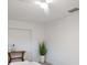 Bright bedroom with a modern ceiling fan and stylish decor at 7404 13Th Avenue W Dr, Bradenton, FL 34209