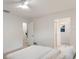 Bright primary bedroom features modern updates, fresh white paint and hardwood floors at 7404 13Th Avenue W Dr, Bradenton, FL 34209