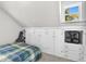 Charming bedroom with built-in storage, window and carpet at 766 13Th S Ave, St Petersburg, FL 33701