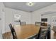 A wood dining room table with chairs, with a view of the kitchen at 766 13Th S Ave, St Petersburg, FL 33701