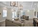 Bright and airy lounge area with comfortable seating, stylish lighting, and neutral decor at 8020 Clearwater Ct, Sarasota, FL 34241
