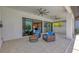 Enjoy outdoor living on this screened-in patio with comfortable seating and serene pool views at 8020 Clearwater Ct, Sarasota, FL 34241