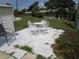 Cozy backyard patio featuring outdoor furniture, great for relaxation and enjoying the outdoor space at 845 S Green Cir, Venice, FL 34285