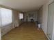 Empty living room offering a blank canvas for customization with natural light and ample space at 845 S Green Cir, Venice, FL 34285