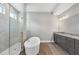 Modern bathroom with a soaking tub, tiled shower, and double sink vanity with granite countertop at 8962 Baroque Ter, Sarasota, FL 34240