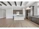 Kitchen with island, stainless appliances, granite counters, and dark wood cabinetry at 8962 Baroque Ter, Sarasota, FL 34240