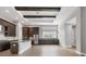 Spacious open kitchen with granite counters, stainless appliances, and dark wood cabinets offer a modern appeal at 8962 Baroque Ter, Sarasota, FL 34240