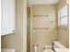 Bathroom with a glass shower, ample towel bars, and a clean, updated design at 9200 Midnight Pass Rd # 30, Sarasota, FL 34242