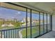 Bright and airy lanai overlooking calm waters and picturesque waterfront community at 9200 Midnight Pass Rd # 30, Sarasota, FL 34242