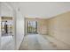 Bright living room with access to a private screened balcony at 9200 Midnight Pass Rd # 30, Sarasota, FL 34242