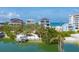 Stunning waterfront homes on a beautiful beach with docks and clear turquoise water at 9200 Midnight Pass Rd # 30, Sarasota, FL 34242