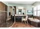 Spacious bathroom with tile shower, standalone tub, double vanity, and a neutral palette at 932 Mangrove Edge Ct, Bradenton, FL 34208