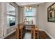 Breakfast nook features a view of the outdoors and stylish pendant lighting at 932 Mangrove Edge Ct, Bradenton, FL 34208