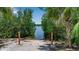 A serene kayak launch area allows residents to enjoy the tranquility of the waterfront in a natural setting at 932 Mangrove Edge Ct, Bradenton, FL 34208