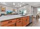 Spacious kitchen with large center island with stainless steel dishwasher and fixtures at 932 Mangrove Edge Ct, Bradenton, FL 34208