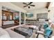 An outdoor kitchen and living space with brick flooring and a grilling area at 932 Mangrove Edge Ct, Bradenton, FL 34208